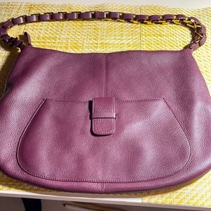 This is a wine purse by Bloomingdales